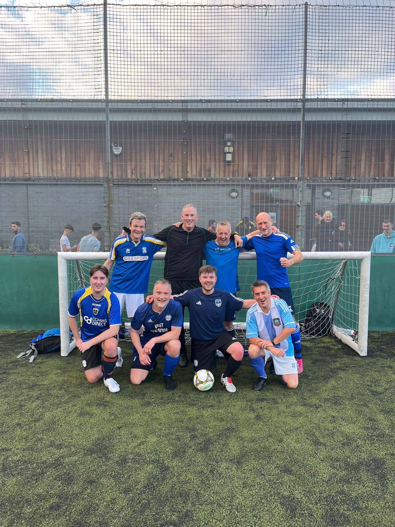 Clwb Ifor Bach team photo celebrating promotion